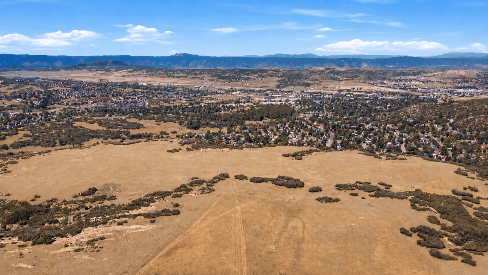Aerial view of the property bordering existing neighborhoods